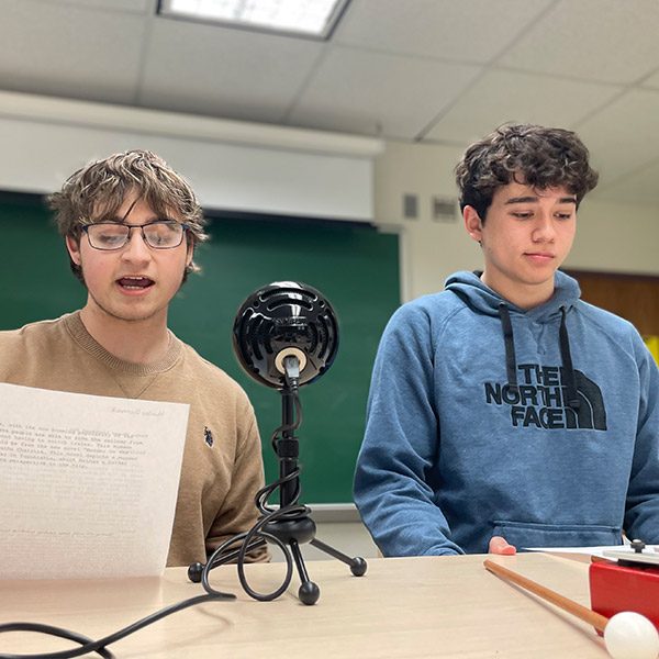 Academy students in class doing a radio broadcast