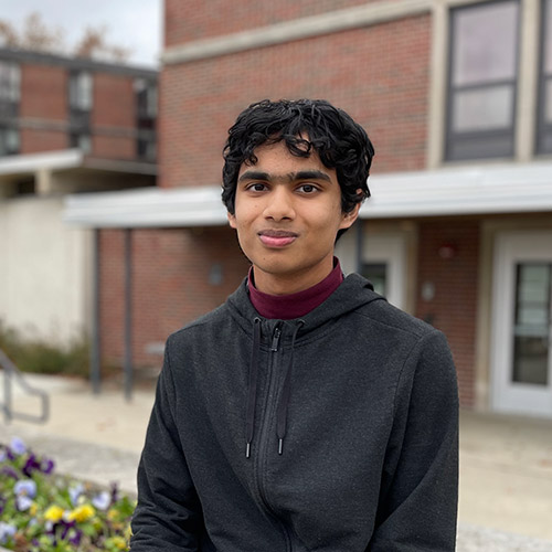 Zishan outside Wagoner Hall